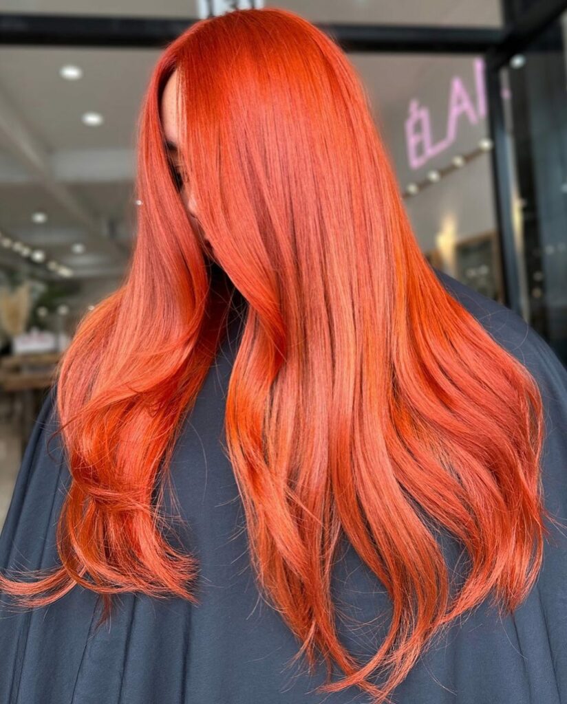 35 Copper Hair Color Ideas to Spice Up Your Look in 2024 24 Copper Orange Hair Color with Subtle Money Piece