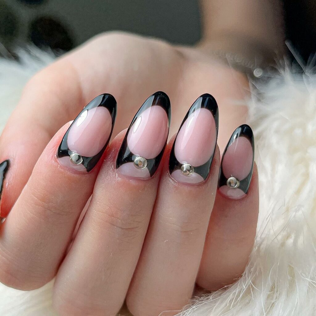 Try 30 Black French Tip Almond Nail Designs of 2024 17 Strength in Simplicity