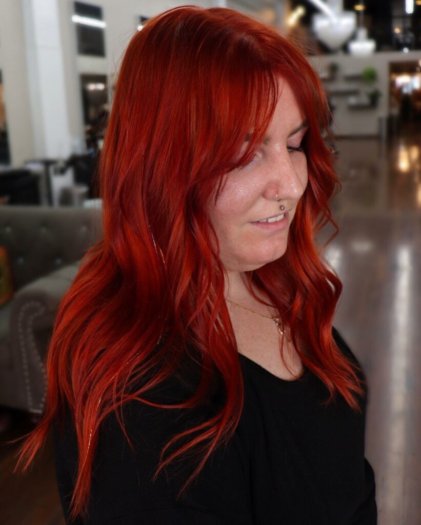 35 Dark Red Hair Ideas to Add Drama to Your Look in 2024 24 Bright Copper Glow on Dark Red Hair