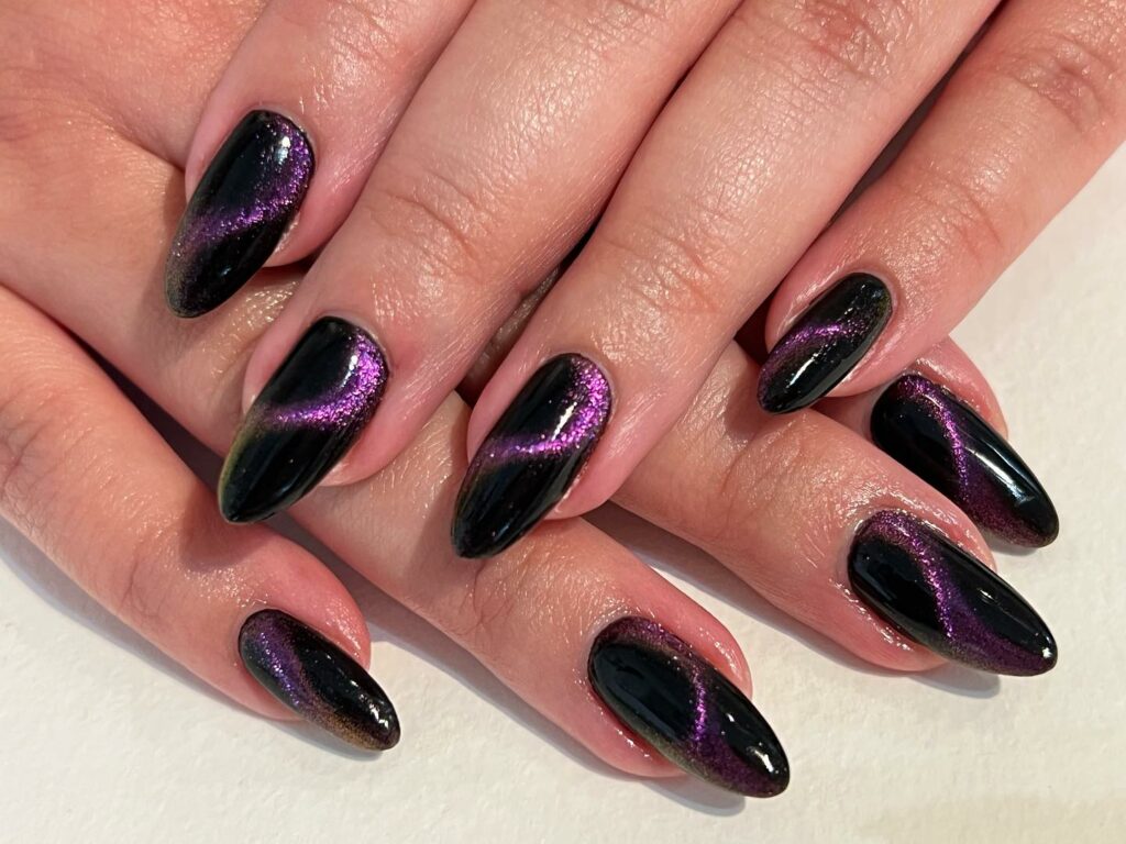 22 Latest Black And Purple Nail Ideas to Try in 2024! 29 Purple Glitter Swirl Design On Black Nail