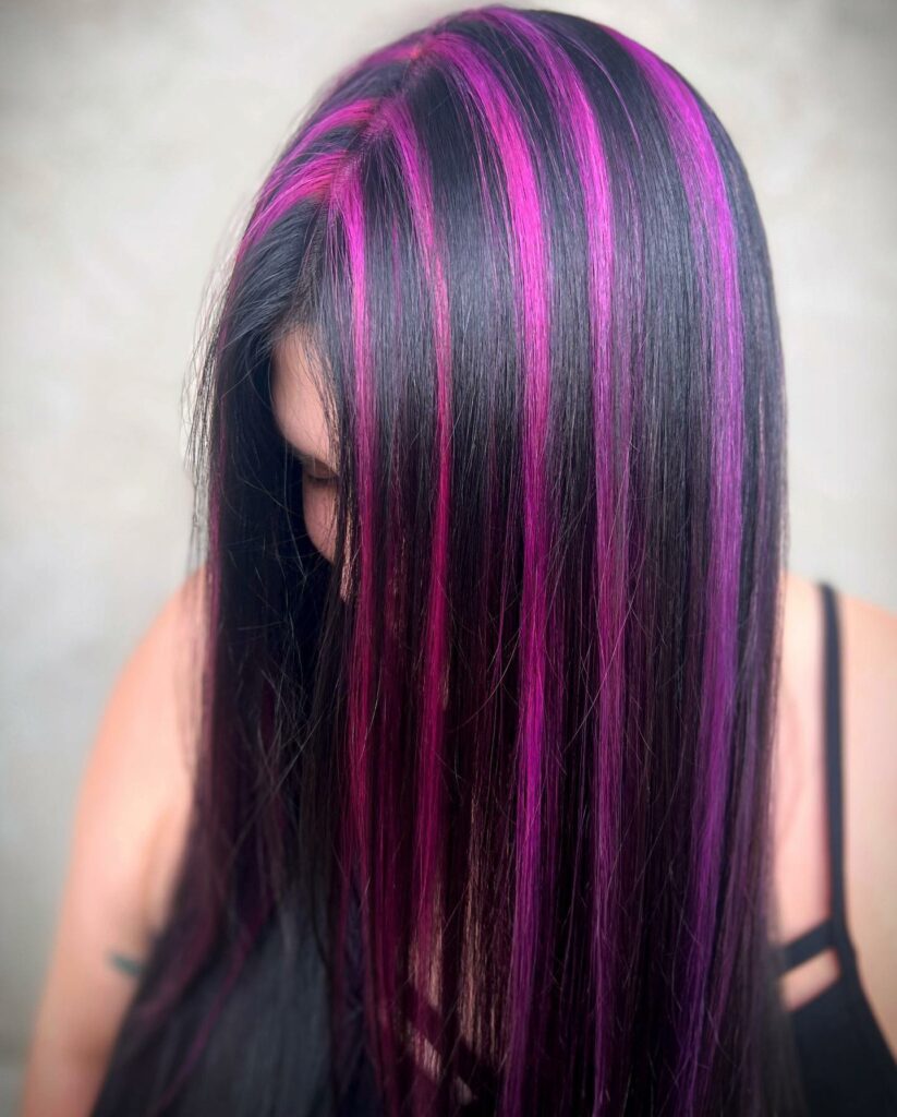 45 Pink Hairstyles to Add a Pop of Color to Your Look in 2024 26 Pink Skunk Stripe Hair