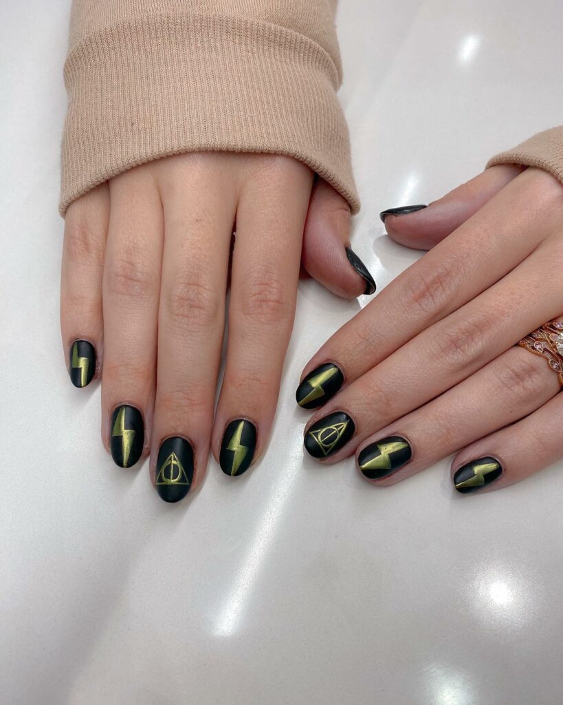 33 Latest Harry Potter Nail Ideas To Try In 2024! 12 Death Hollows Harry Potter Design On Black Base Nails