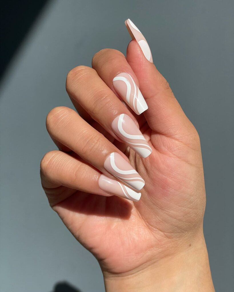 28 Latest Nude And White Nail Designs To Try in 2024! 20 White Swirl Coffin Nails