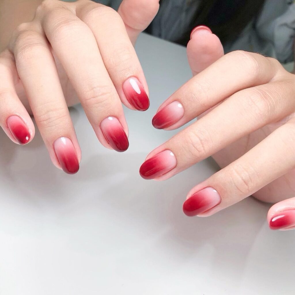 Transition Gracefully with 20 Christmas Ombré Nail Ideas in 2024 31 Red and Nude Christmas Ombré Nails