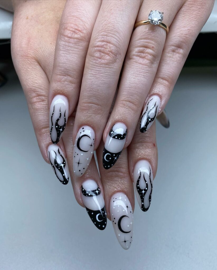 40 Latest Black Stiletto Nail Ideas To Try In 2024! 45 Dark Black Star And Moon Stiletto Nails