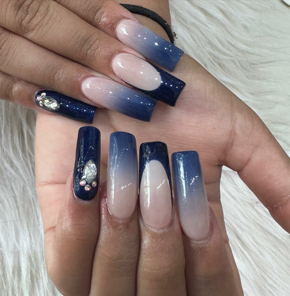 30 Latest Navy Blue Nail Designs To Try In 2024! 10 Get Glam With Ombre Navy Blue And Glitter