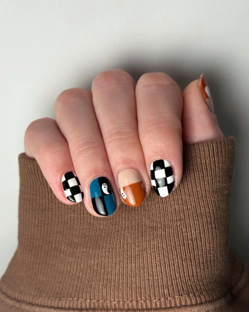 20 Latest Checkered Nail Designs To Try In 2024! 24 Small Round Checkered Nails With Cute Ghost Spooks