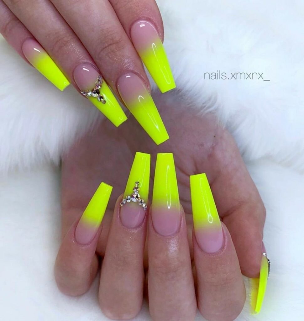 20 Latest Neon Yellow Nail Ideas To Try In 2024! 12 Neon Yellow Ombre Coffin Nails With Rhinestones