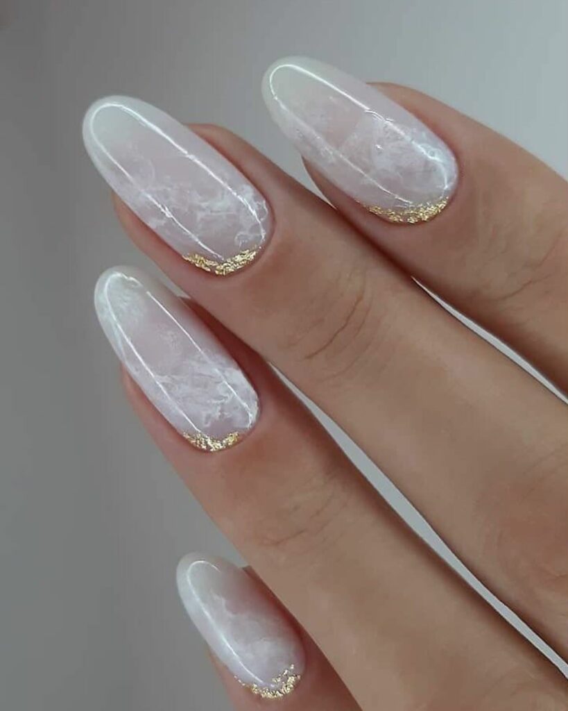 Embrace Elegance with 15 White Marble Nail Designs in 2024 22 White Marble Round Nails With Gold Design