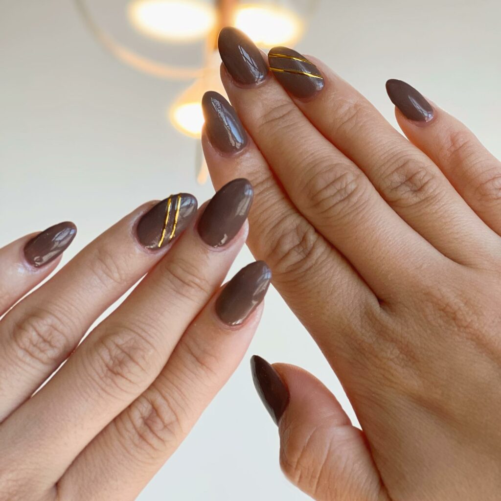 Find Your Style with 28 Beige Nail Designs of 2024 36 Dark Beige Nails With Gold Accents