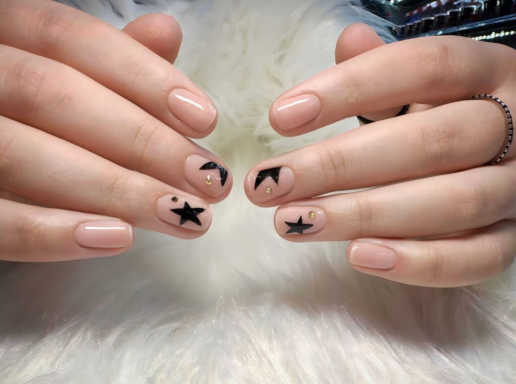 20 Latest Nude Short Nail Ideas To Try In 2024! 31 Short Nude Nails With Black Star Design