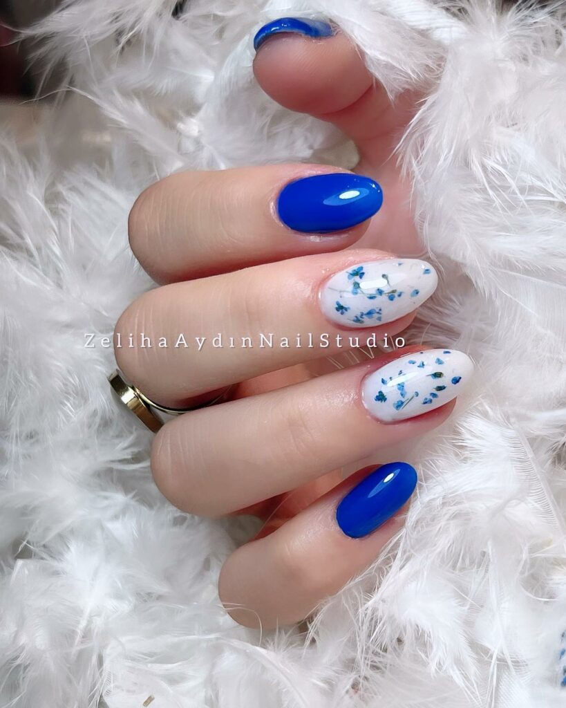 30 Latest Blue And White Nail Ideas To Try In 2024! 27 Blue And White Nails With Flower Design