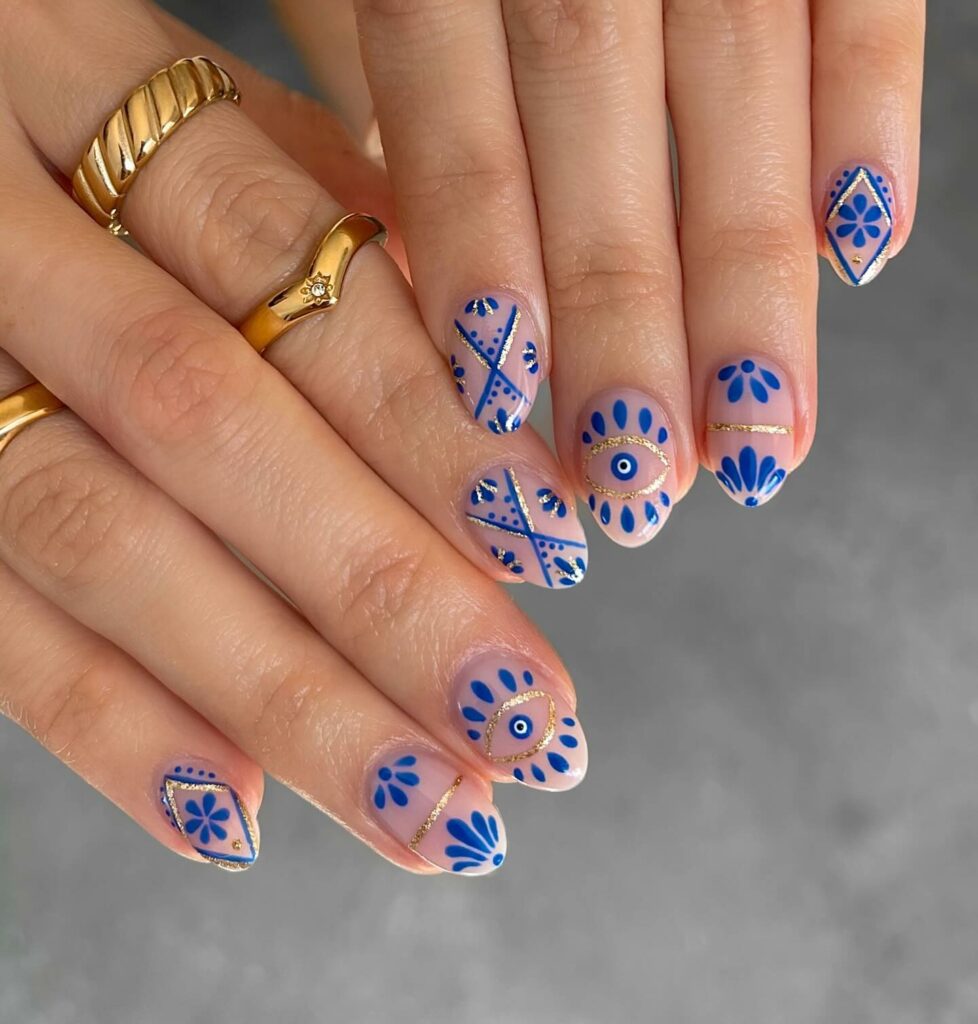 20 Latest Short Blue Nail Designs To Try In 2024! 27 Blue Short Nails With Porcelain And Evil Eye Design