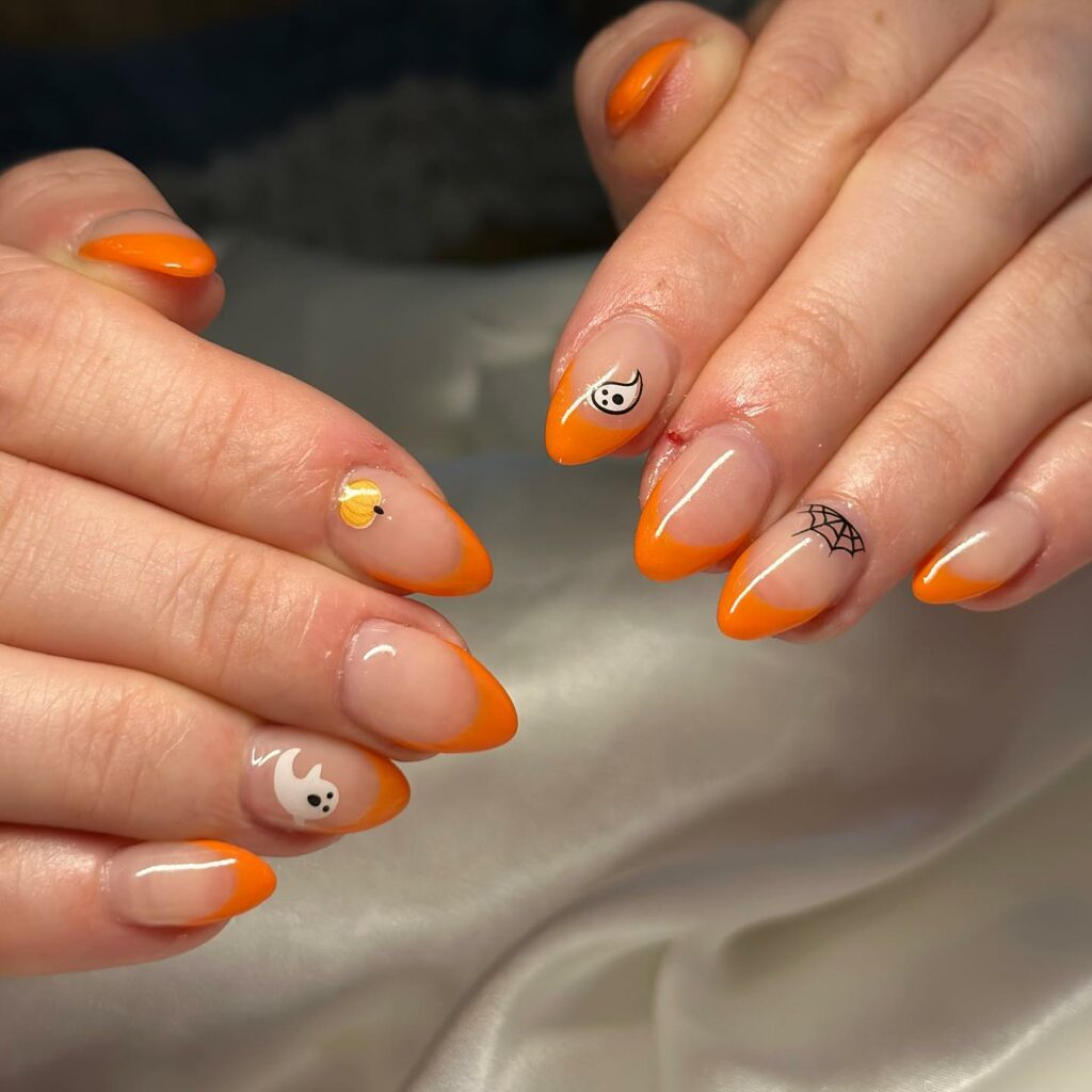 Bring Sunshine with 20 Orange French Tip Nail Designs in 2024 37 Orange French Tip Nails With Ghost, Pumpkin, And Spider Web Design