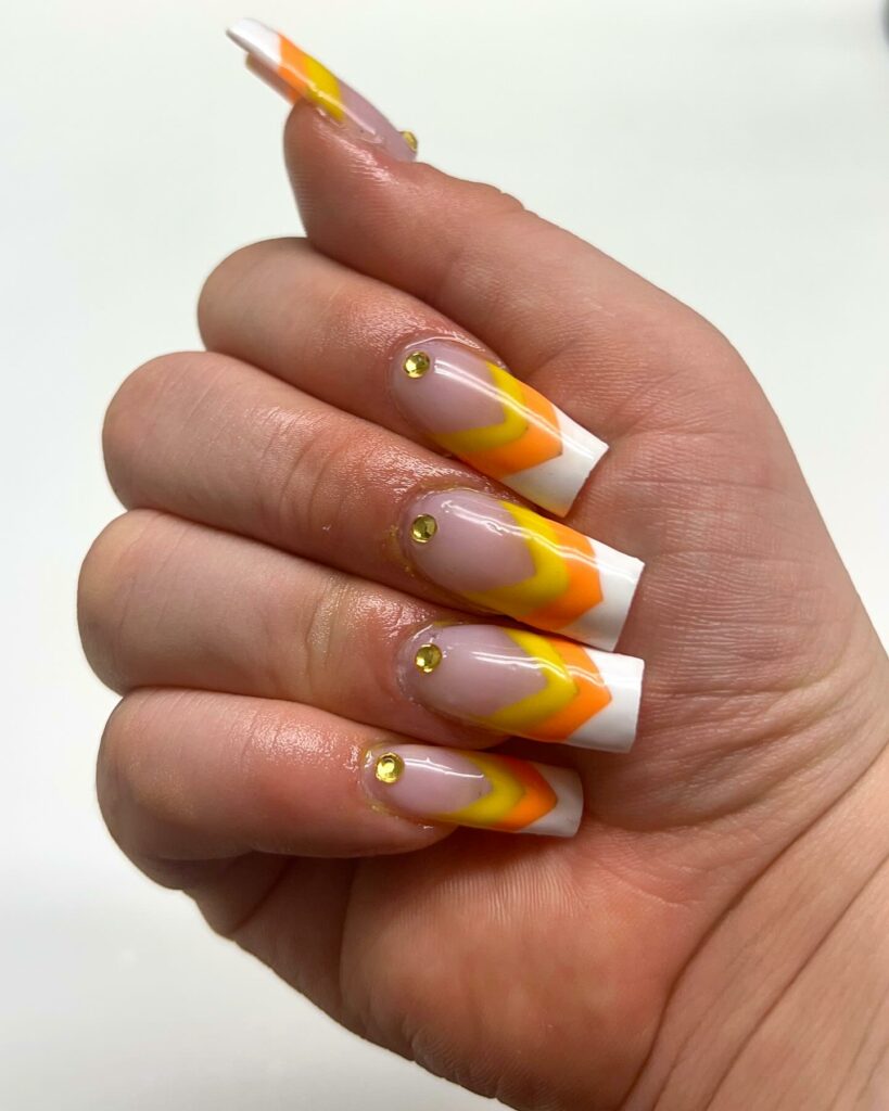 20 Latest Candy Corn Nail Design To Try In 2024! 29 Candy Corn Square Nails With Rhinestones