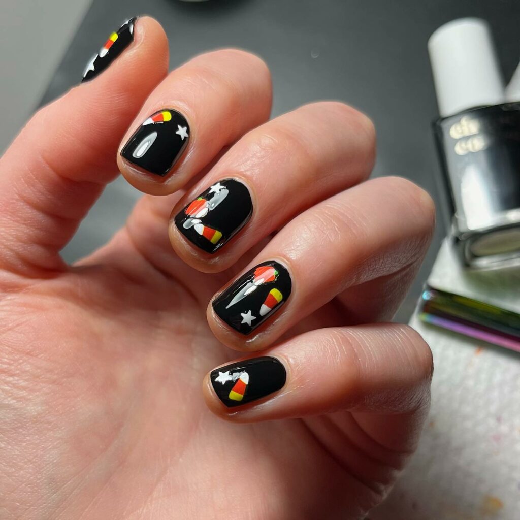 20 Latest Candy Corn Nail Design To Try In 2024! 24 Candy Corn Design On Black Base Nails