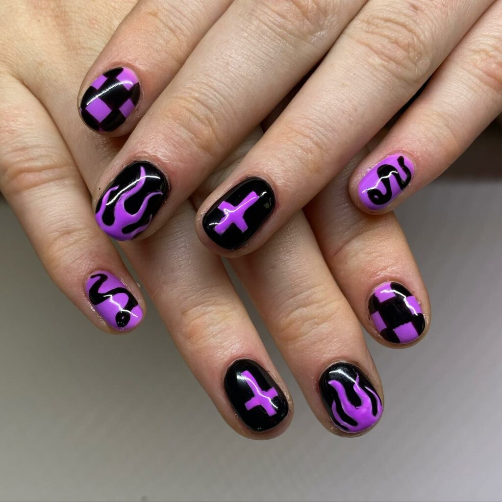 22 Latest Black And Purple Nail Ideas to Try in 2024! 46 Black And Purple Nail With Snake, Cross, Flame, And Checkered Design