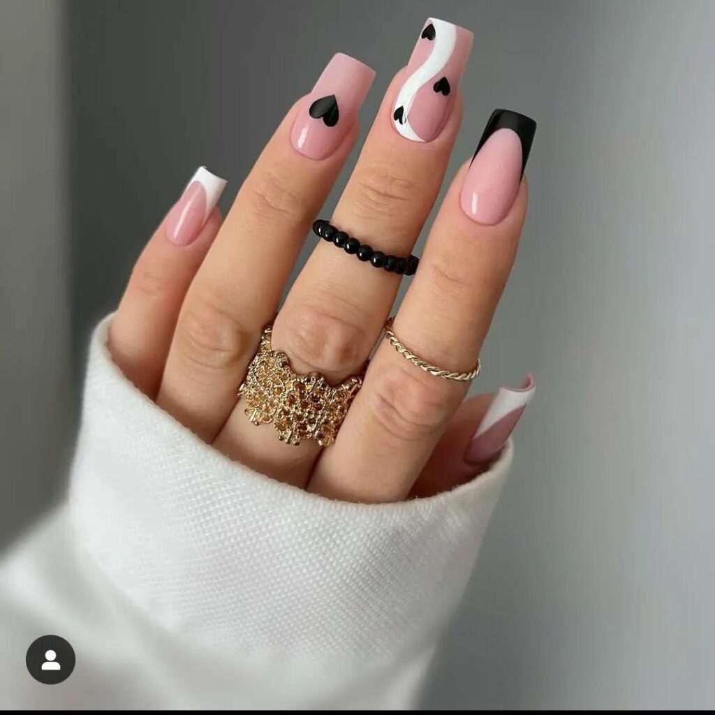 40 Latest Trendy Nail Ideas To Try In 2024! 23 Black And White French With Black Heart Trendy Nails