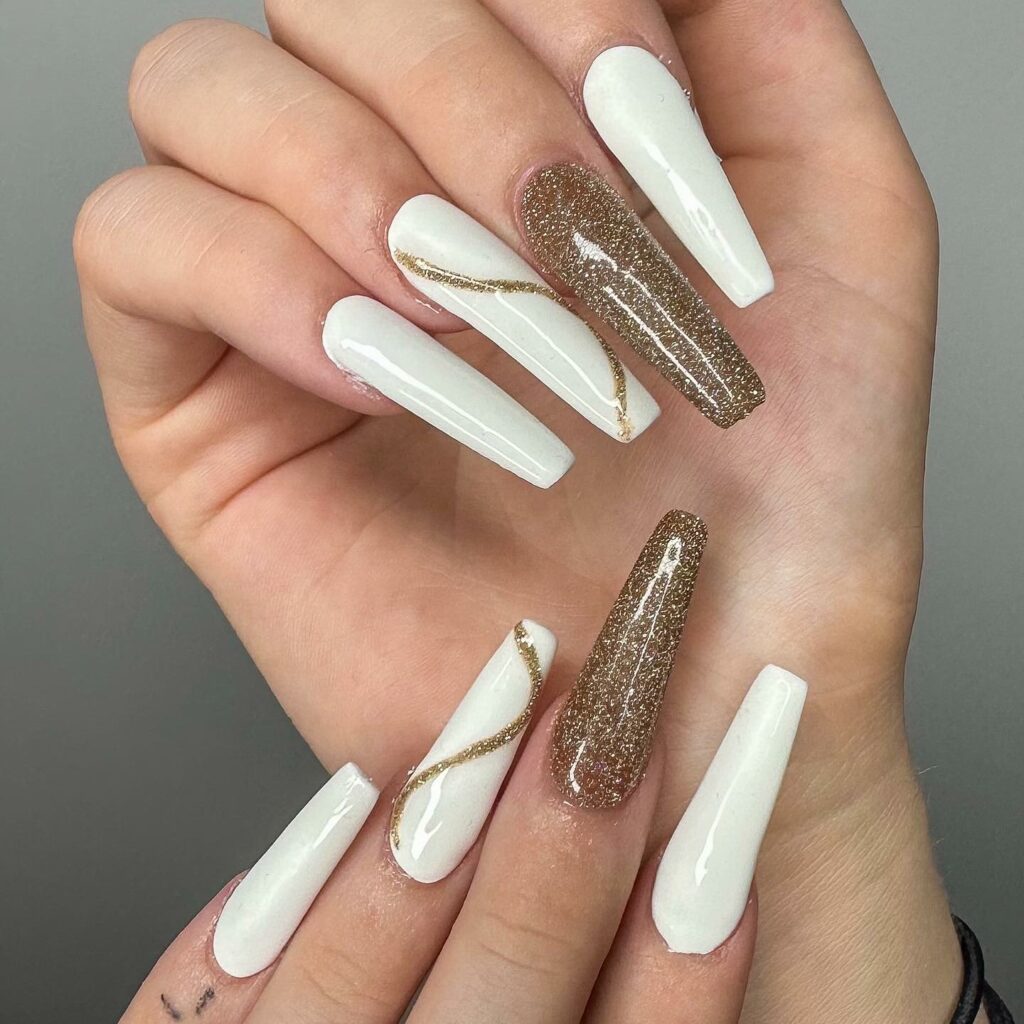 30 Latest White And Gold Nail Ideas To Try In 2024! 47 White And Gold Nails With Swirls Design