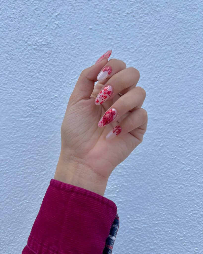 Embrace the Night with 33 Vampire Nail Designs for 2024 22 3D Ghost and Bloody Nails