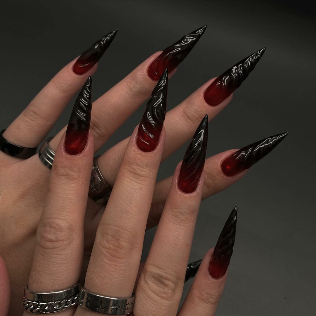 25 Latest Gothic Nail Ideas To Try In 2024! 13 Black And Red Ombre Gothic Nails With 3D Swirl