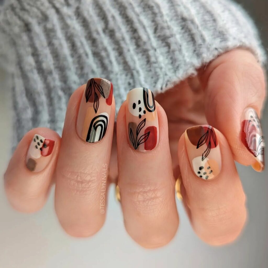 21 Latest Abstract Nail Art Ideas To Try in 2024! 20 Abstract Harmony: A Fusion of Geometric Shapes and Organic Lines in Nail Art Masterpiece