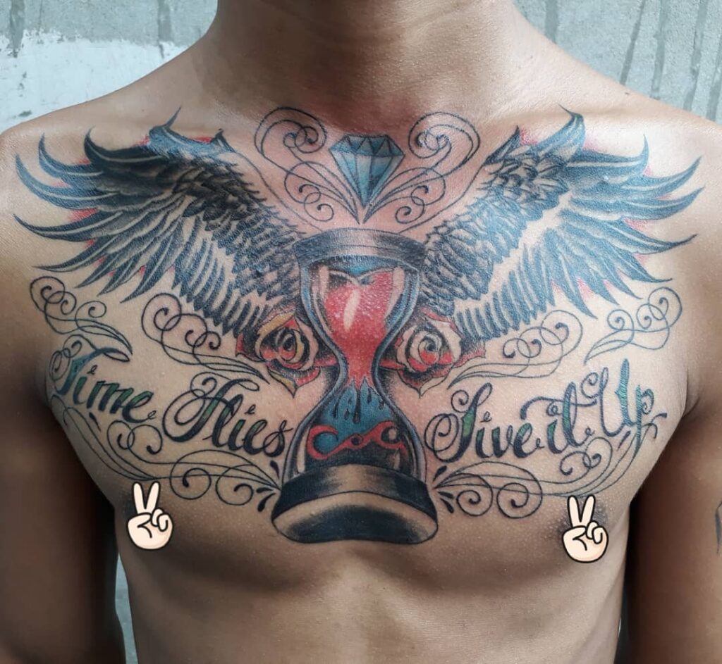11+ Chest Wing Tattoo Ideas That Will Blow Your Mind! 15 Full Angel Wings Chest Tattoo With An Hourglass And A Quote