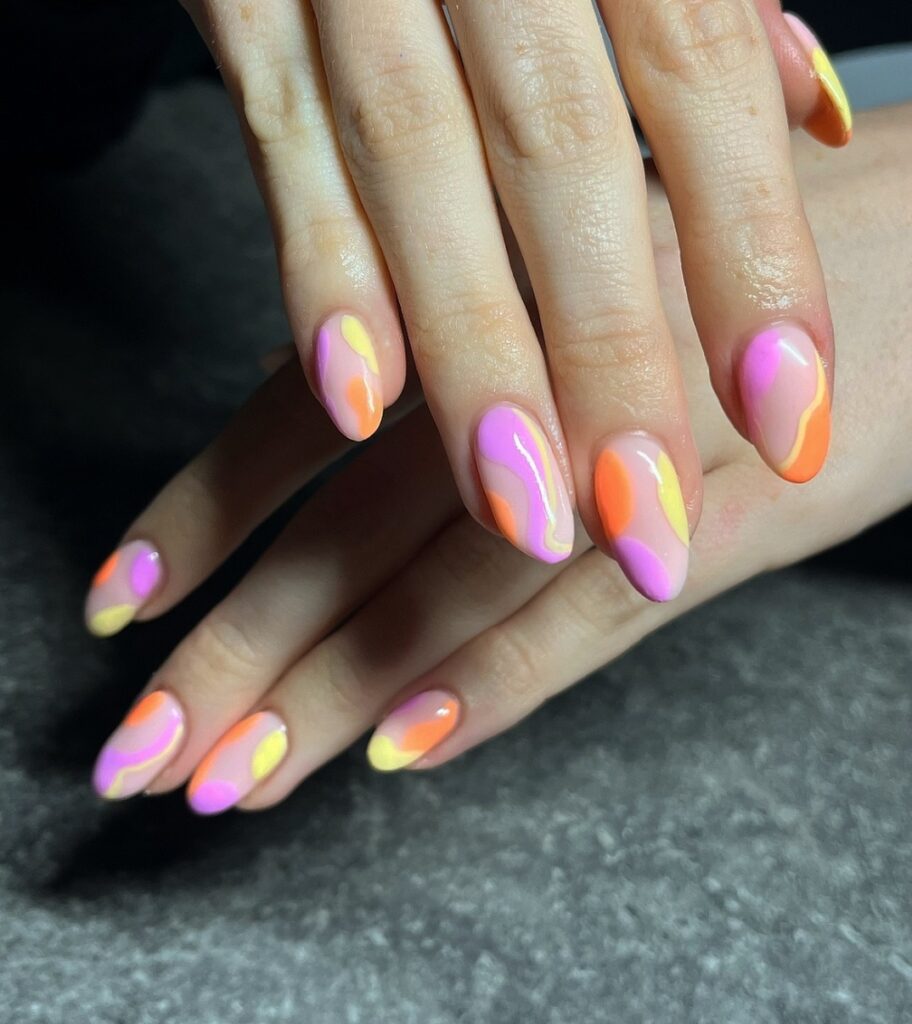 20 BEST 70S NAIL DESIGNS TO TRY IN 2024! 26 Abstract 70s Almond Nails