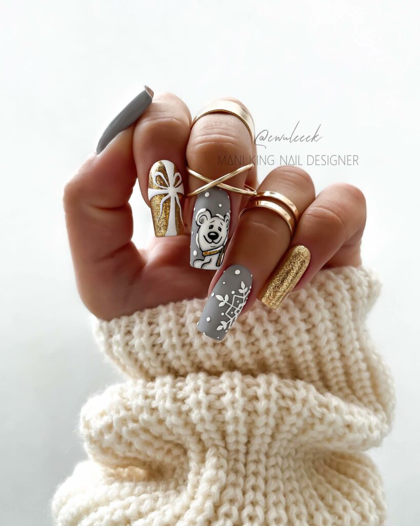 30 Latest Winter Nail Ideas To Try In 2024! 29 Grey And Gold Winter Nails With Polar Bear