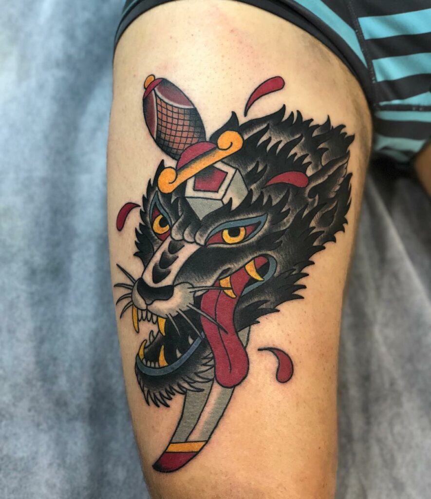12+ BEST WOLF TATTOO DESIGNS & MEANING FOR MEN AND WOMEN 15 American Traditional Wolf Tattoo