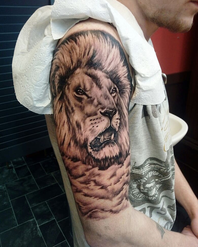 AMAZING PROTECTION TATTOO DESIGNS & MEANINGS IN 2024 21 African Lion Tattoo