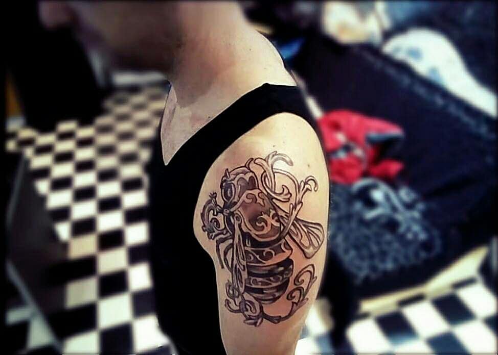 10 AMAZING BEE TATTOO IDEAS + MEANINGS - NEW FOR 2024 17 Tribal Bee Tattoo