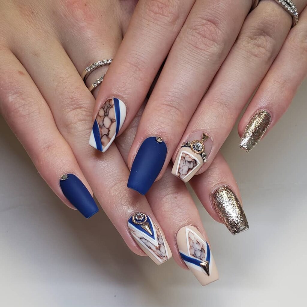 30 Latest Navy Blue Nail Designs To Try In 2024! 28 Matte Navy And Bronze
