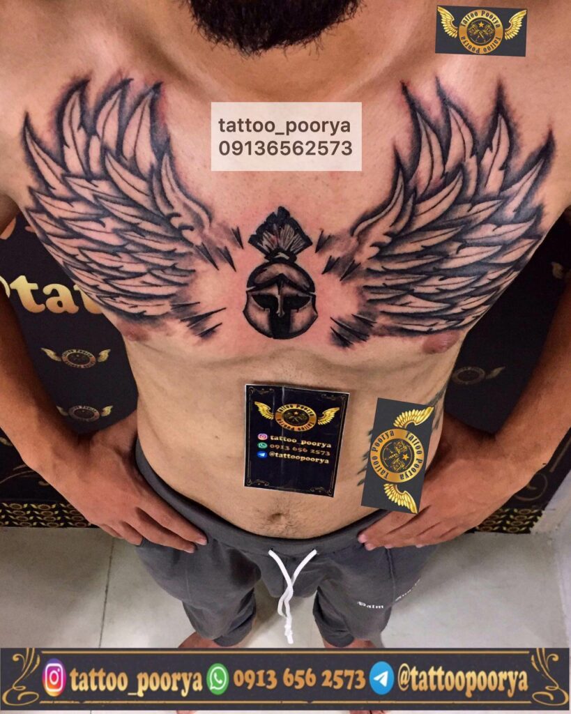 11+ Chest Wing Tattoo Ideas That Will Blow Your Mind! 14 Awesome Angel Wings Tattoo With Tribal Design In The Middle