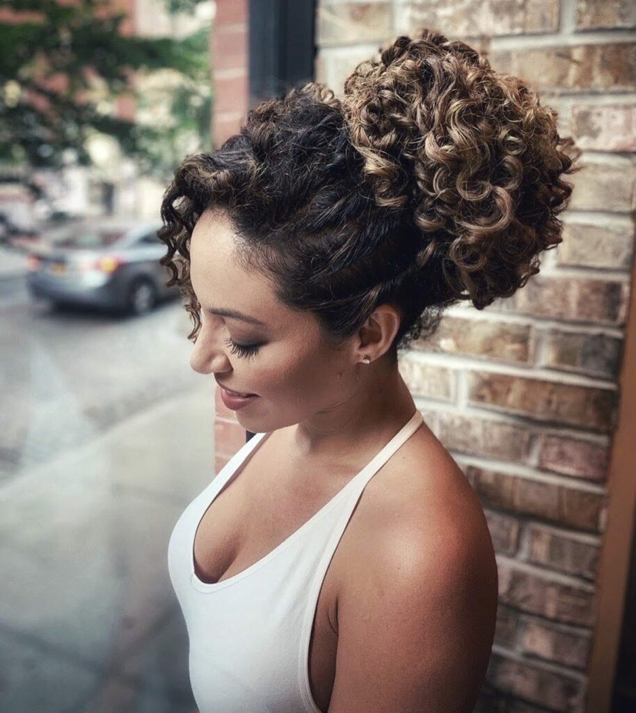 30 Curly Hairstyles Ideas to Flaunt Your Curls in 2024 20 Bow Bun