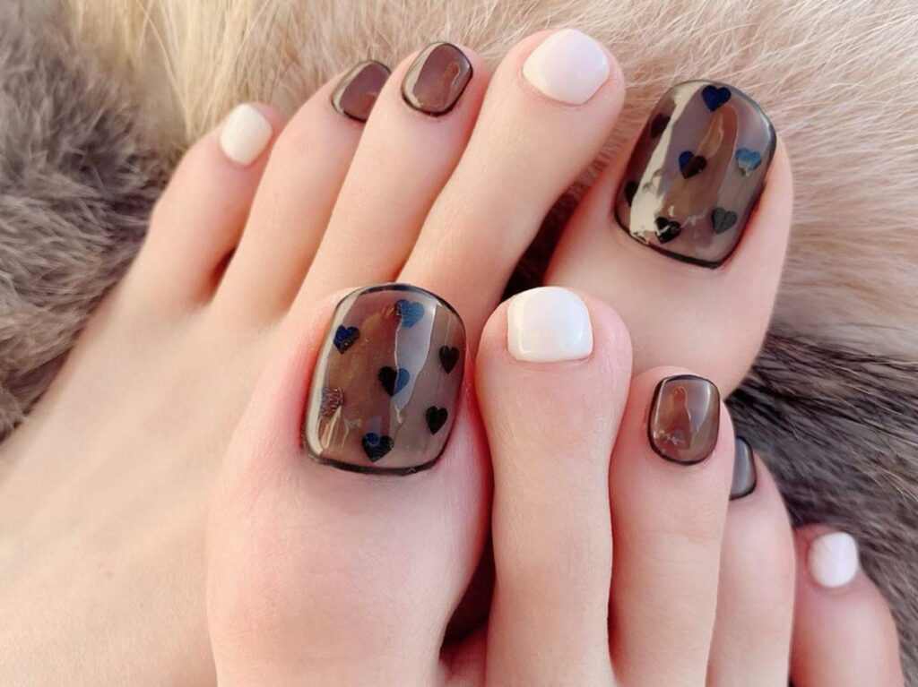 Get Playful with 30 Heart Toenail Pedicure Ideas for 2024 27 Black Heart Nail