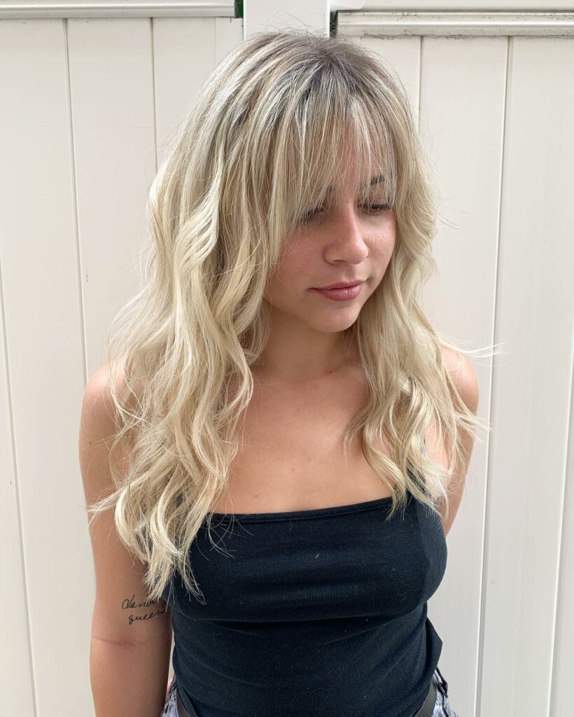 35 Long Wolf Cut Hairstyle Ideas to Try in 2024 29 Long Warm Blonde Wolf Cut
