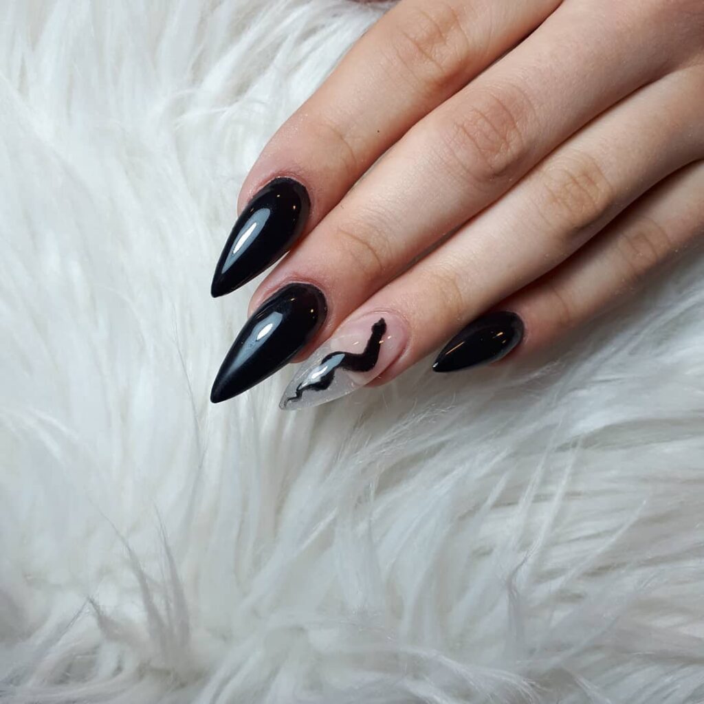 30 Latest Snake Nail Designs To Try In 2024! 35 Black Snake Accent Stiletto Nails