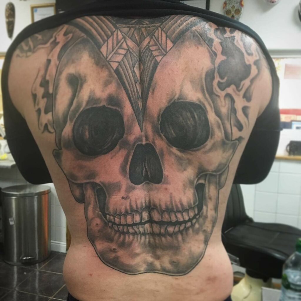 11+ Skull Back Tattoo Ideas That Will Blow Your Mind! 10 Skull Back Tattoo
