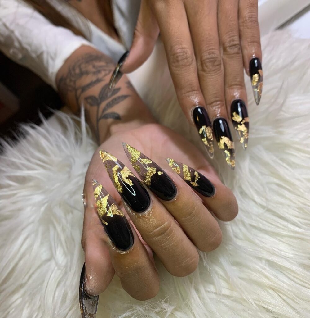 40 Latest Black Stiletto Nail Ideas To Try In 2024! 34 Black Stiletto Gold Flakes Nails