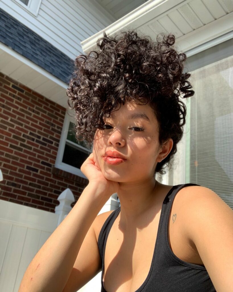 25 Natural Hairstyles Ideas to Embrace Your Authenticity in 2024 21 Pineapple Hair