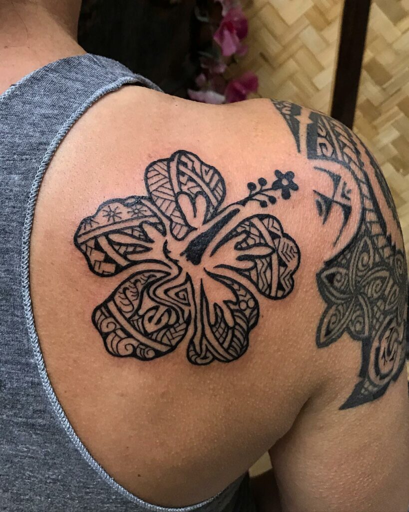 AMAZING HIBISCUS TATTOOS IDEAS ALONG WITH THEIR MEANINGS - UPDATED FOR 2024 19 Tribal Hibiscus Tattoos