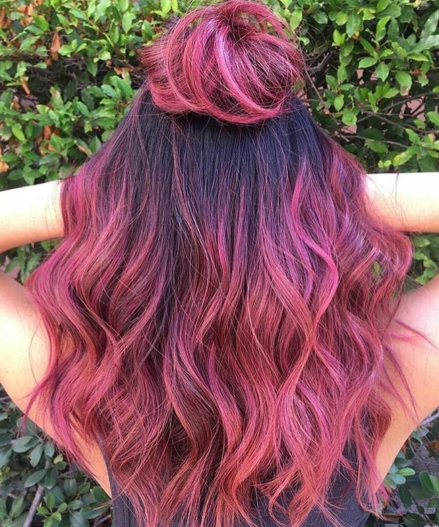 45 Pink Hairstyles to Add a Pop of Color to Your Look in 2024 33 Wavy Pink Hair