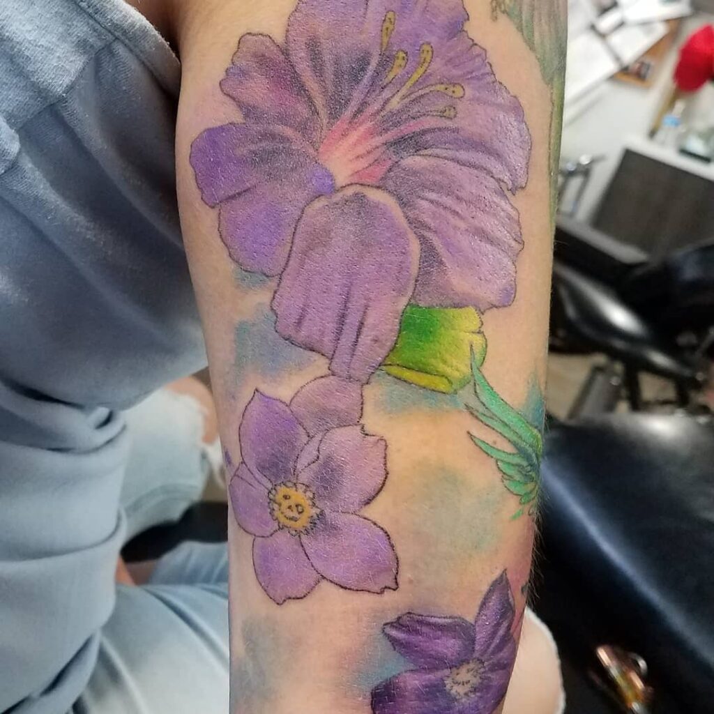 AMAZING HIBISCUS TATTOOS IDEAS ALONG WITH THEIR MEANINGS - UPDATED FOR 2024 11 Purple Hibiscus Tattoo