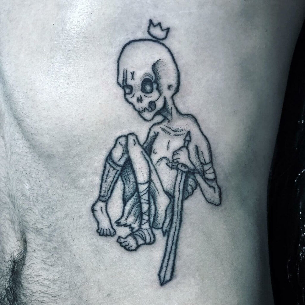 11+ Corpse Tattoo Ideas That Will Blow Your Mind! 17 A Battle King Corpse Tattoo