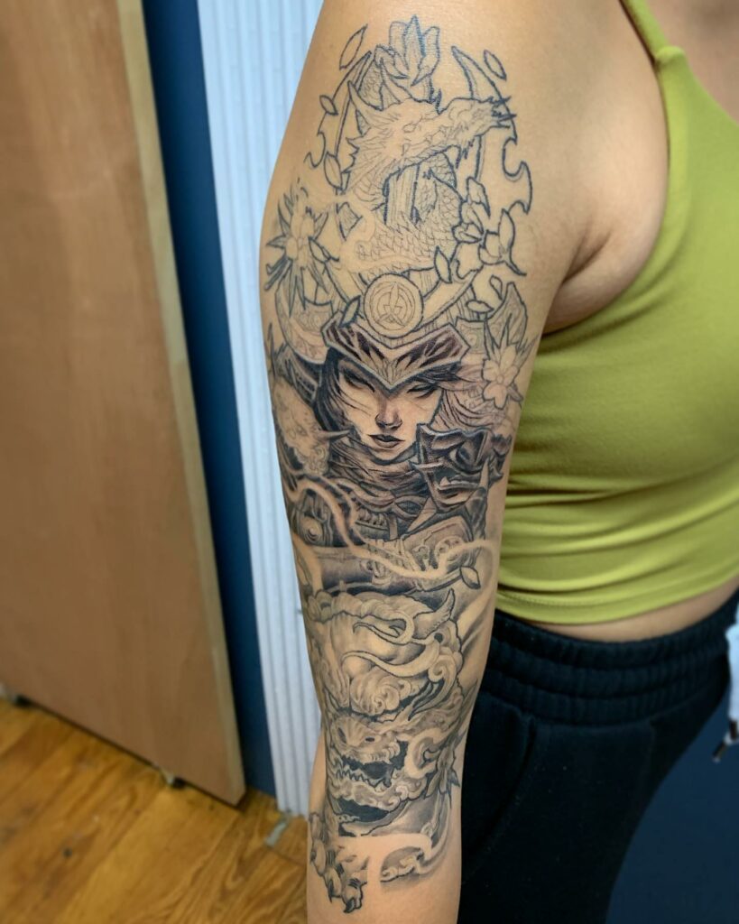 12+ Samurai Girl Tattoo Ideas To Inspire You! 17 A Blackwork Girl Samurai Big Arm Tattoo Design