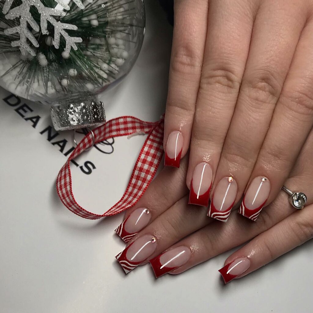 Explore 40 Red French Tip Nail Designs for 2024 23 A Glitter Base Extravaganza