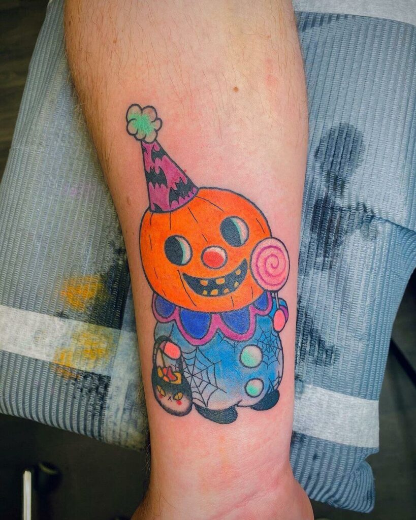 11+ Cute Pumpkin Tattoo Ideas That Will Blow Your Mind! 19 A Halloween Themed Pumpkin Tattoo