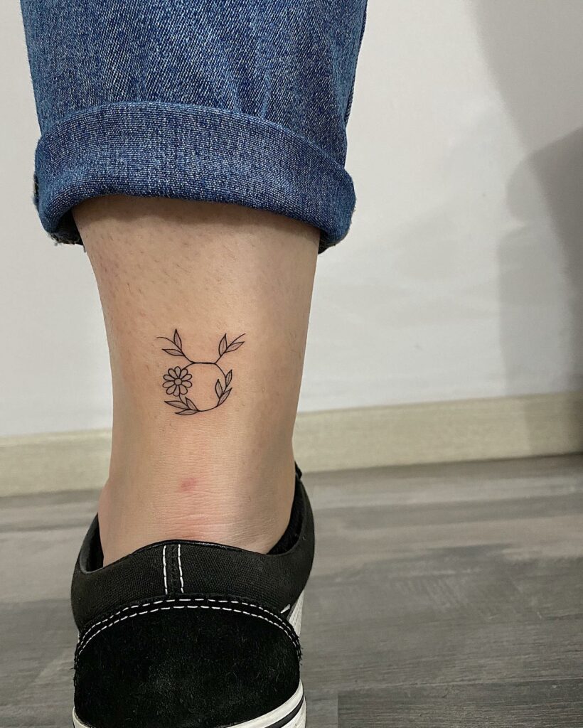 11+ Taurus Tattoo Simple Ideas That Will Blow Your Mind! 17 A Minimal Floral Taurus Symbol Tattoo