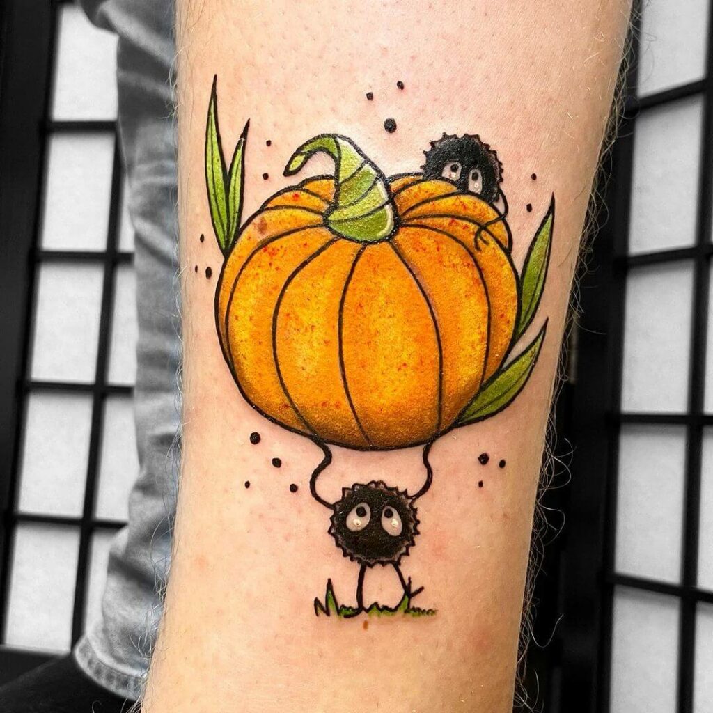 11+ Cute Pumpkin Tattoo Ideas That Will Blow Your Mind! 18 A Pumpkin Tattoo With Susuwatari
